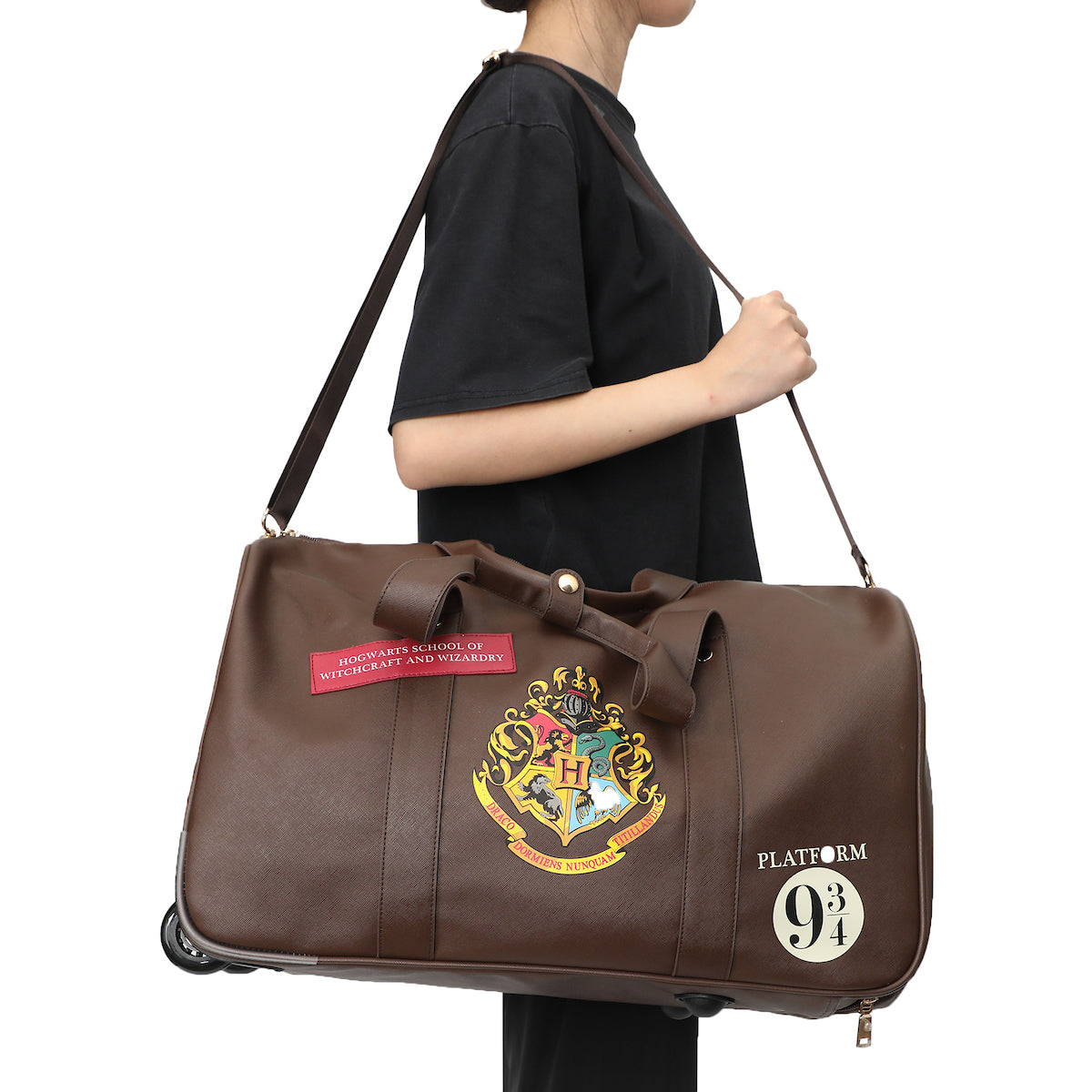 Harry Potter Rolling PU Duffle Bag - Officially Licensed Travel Luggage with Patches and Applique in Brown