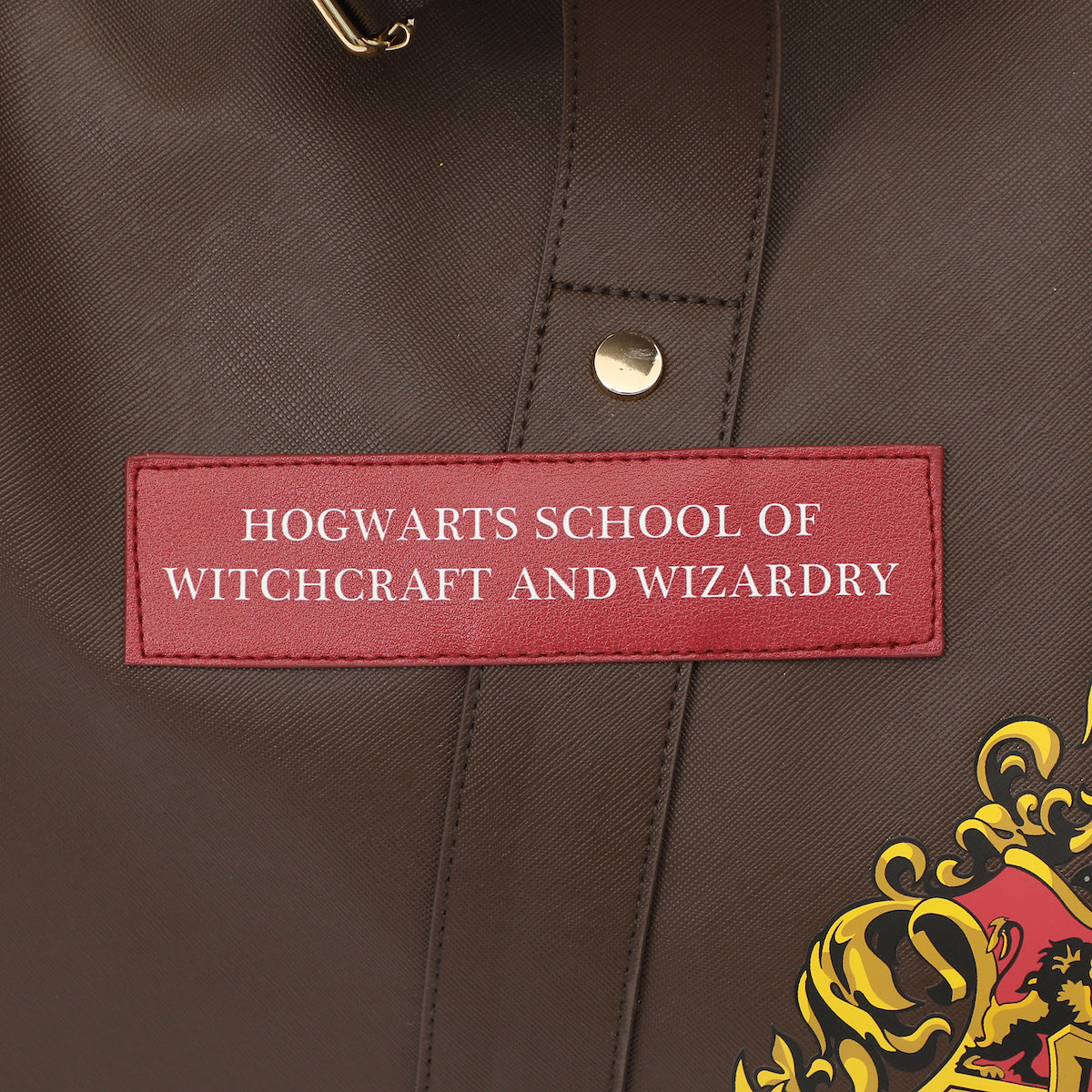 Harry Potter Rolling PU Duffle Bag - Officially Licensed Travel Luggage with Patches and Applique in Brown