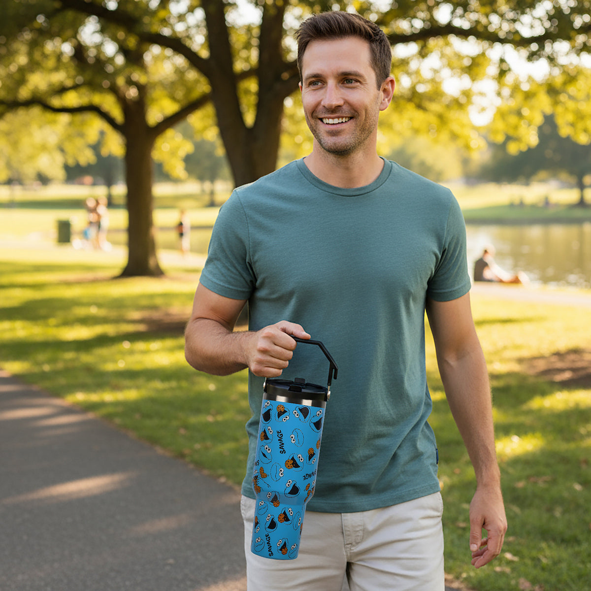 Sesame Street Cookie Monster AOP 40 Oz. Vacuum Sealed Stainless Steel Tumbler With Carry Handle